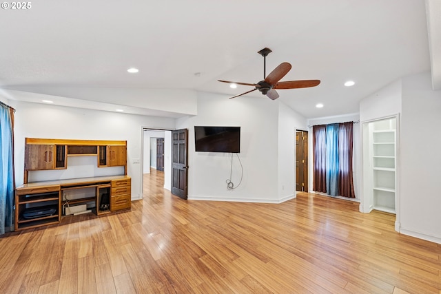 unfurnished living room featuring recessed lighting, vaulted ceiling, light wood-style flooring, and ceiling fan