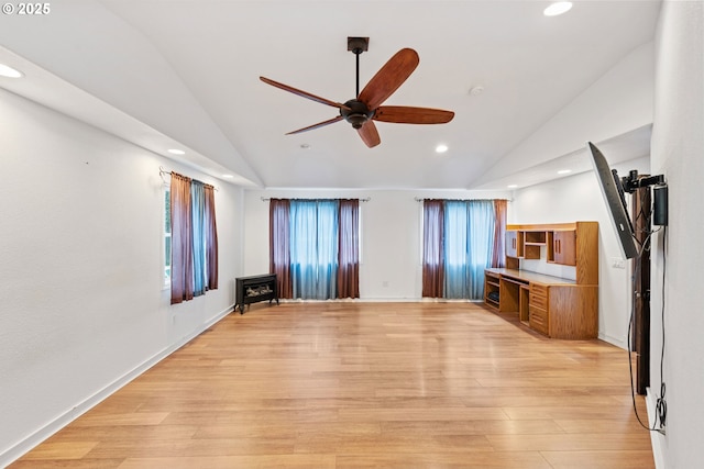 unfurnished living room featuring vaulted ceiling, ceiling fan, recessed lighting, and light wood-style floors