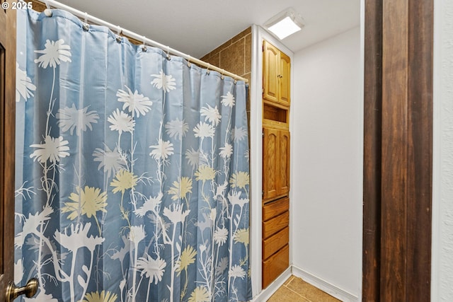 bathroom featuring tile patterned flooring