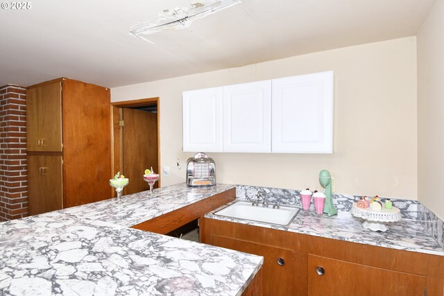 13275 NE Thompson Ct, Portland, OR 97230 - kitchen featuring a sink and white cabinetry