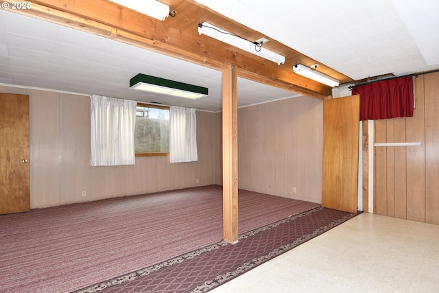 13275 NE Thompson Ct, Portland, OR 97230 - basement featuring wooden walls, tile patterned floors, and carpet