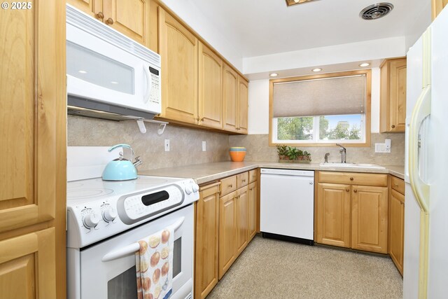13275 NE Thompson Ct, Portland, OR 97230 - kitchen featuring white appliances, light countertops, backsplash, and recessed lighting