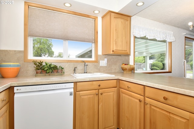 13275 NE Thompson Ct, Portland, OR 97230 - kitchen with white dishwasher, light brown cabinets, light countertops, tasteful backsplash, and recessed lighting