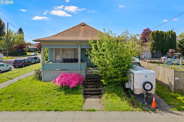 2104 N Rosa Parks Way, Portland, OR 97217 - view of front of home featuring covered porch, stairs, and a shingled roof
