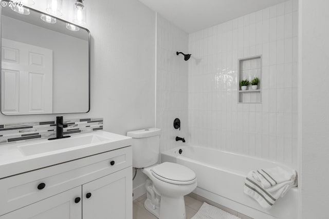 full bathroom featuring backsplash, vanity, toilet, and bathtub / shower combination