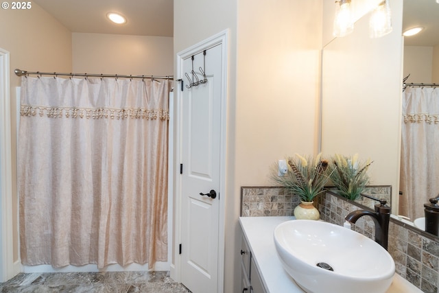 bathroom with vanity and a shower with shower curtain