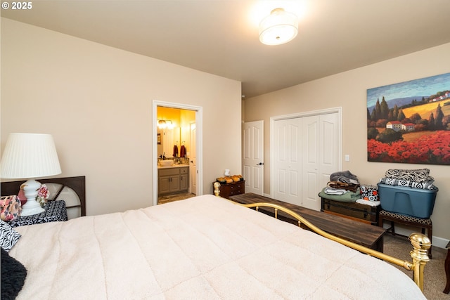 bedroom featuring ensuite bath and a closet