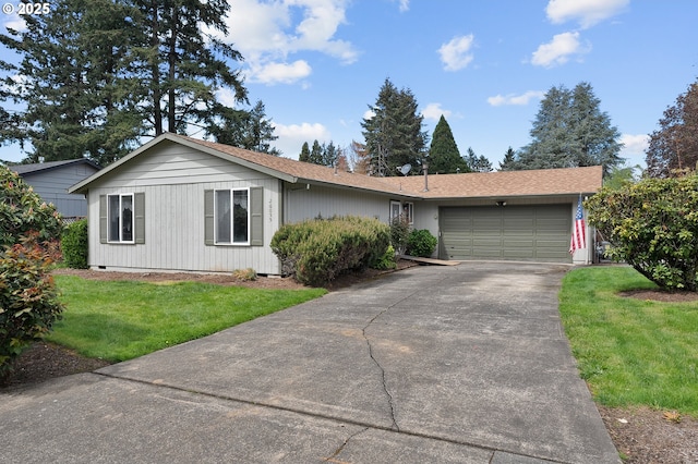 ranch-style home with a garage, a front lawn, driveway, and crawl space