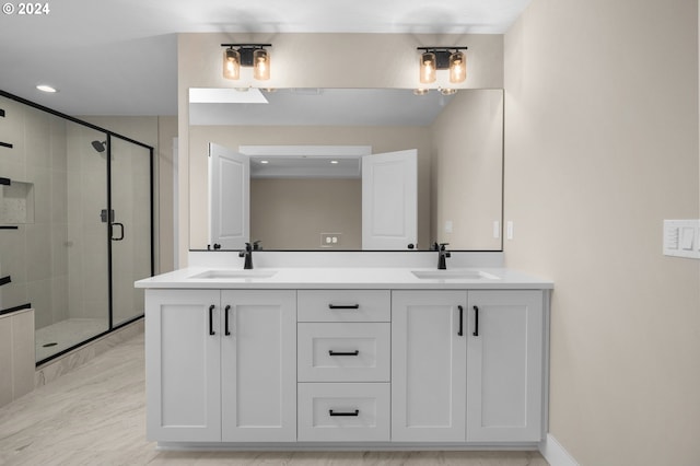full bathroom featuring double vanity, a sink, recessed lighting, and a shower stall