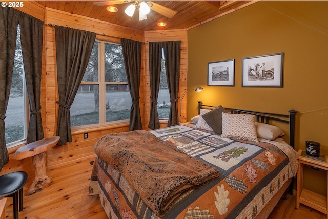 16830 Delicious St, Bend, OR 97703 - bedroom with wooden ceiling, light wood finished floors, and wooden walls