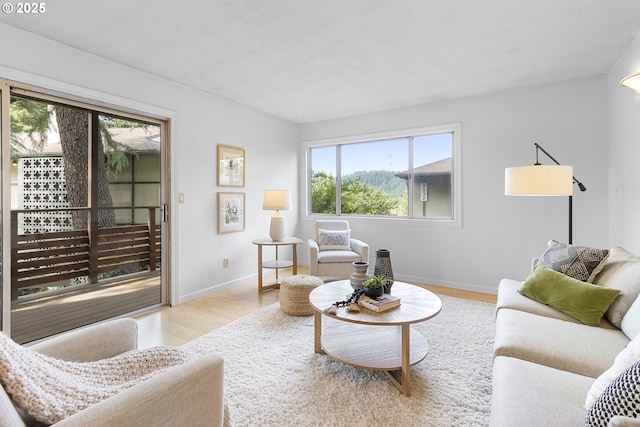 3038 SW Florida Ct Unit B, Portland, OR 97219 - living area featuring wood finished floors and baseboards