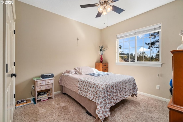 bedroom with carpet floors, baseboards, and ceiling fan