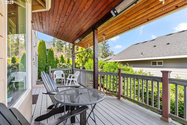 deck featuring outdoor dining area