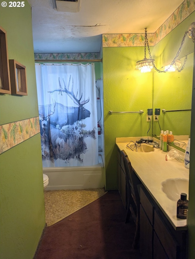 full bathroom with toilet, shower / bath combination with curtain, and vanity