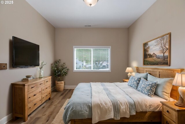420 Bryant St, Clatskanie, OR 97016 - bedroom with light wood-style flooring and baseboards