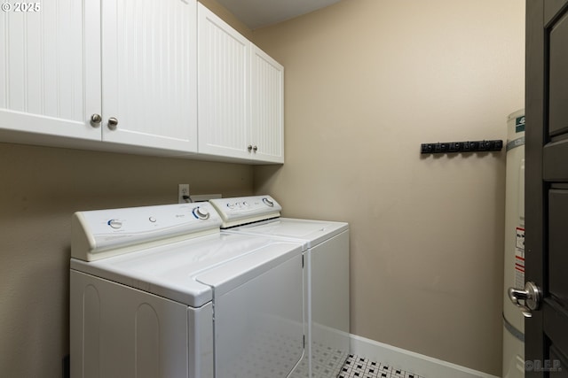 420 Bryant St, Clatskanie, OR 97016 - laundry area featuring cabinet space, washing machine and dryer, and baseboards