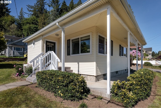 420 Bryant St, Clatskanie, OR 97016 - view of front of home featuring crawl space and a porch