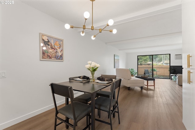 dining room with hardwood / wood-style floors, a notable chandelier, and beam ceiling