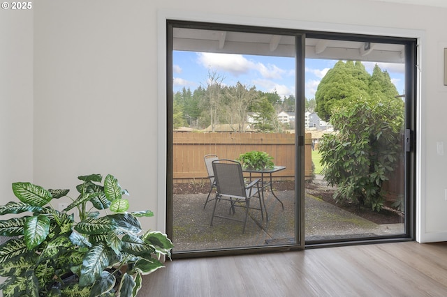 doorway to outside featuring hardwood / wood-style floors