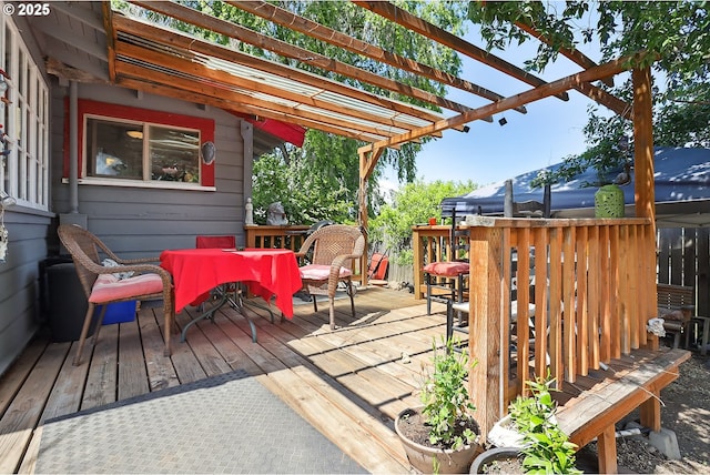 317 E 14th St, The Dalles, OR 97058 - wooden deck with outdoor dining area and a pergola