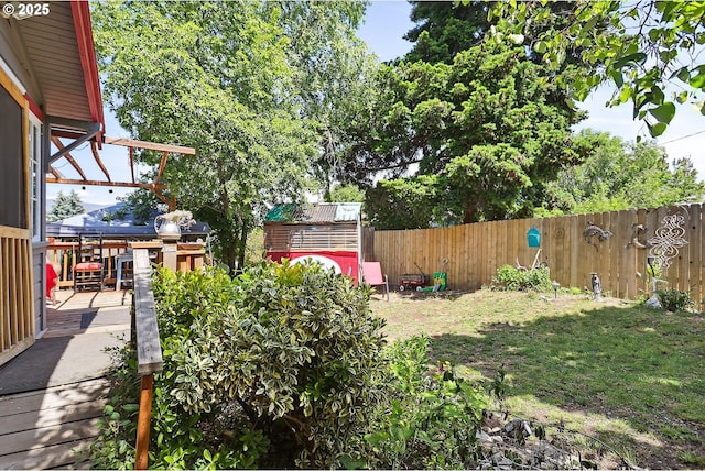 317 E 14th St, The Dalles, OR 97058 - view of yard with a wooden deck