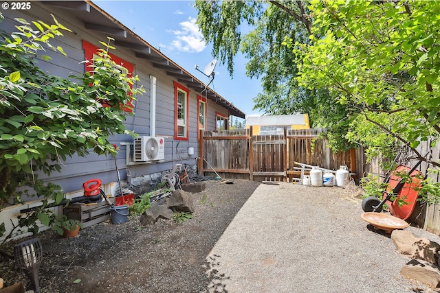 317 E 14th St, The Dalles, OR 97058 - view of yard featuring ac unit and a patio area