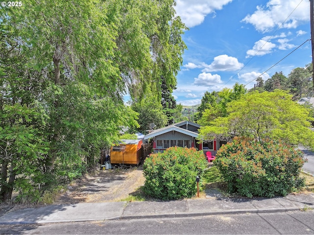 317 E 14th St, The Dalles, OR 97058 - obstructed view of property featuring driveway