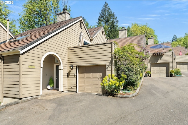 view of front of property featuring a chimney