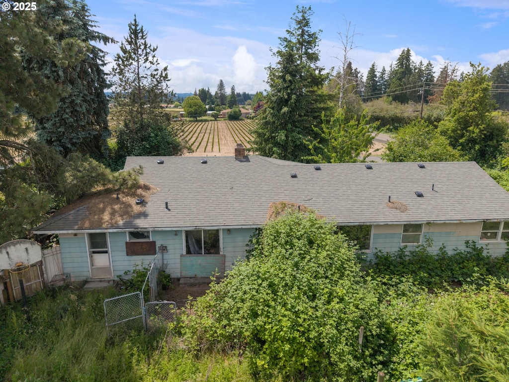 7044 SW Jacktown Rd, Beaverton, OR 97078 - back of house featuring a shingled roof