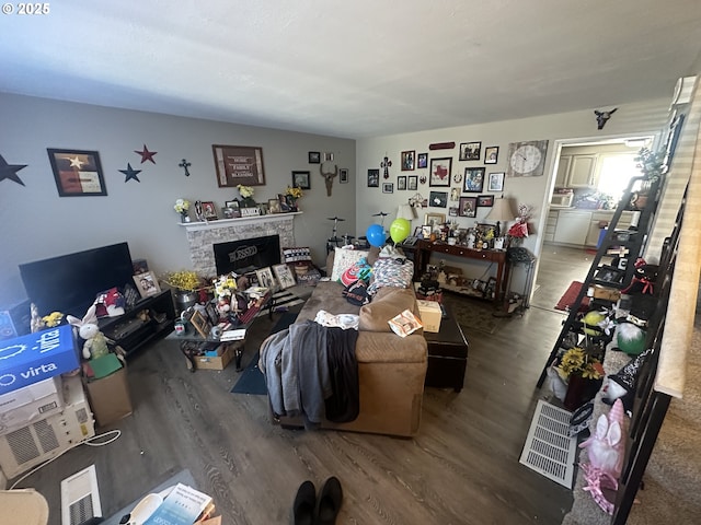 living room featuring dark wood-type flooring