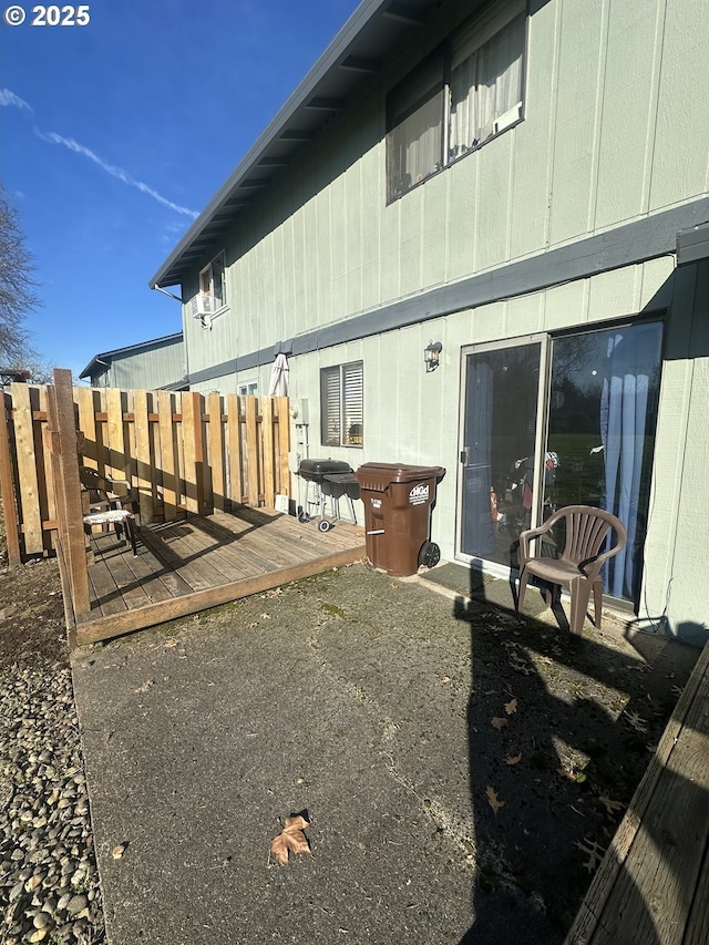 back of house featuring a deck