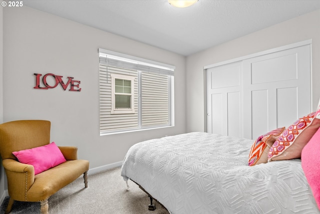 3477 SE Salmonfly Ln, Hillsboro, OR 97123 - carpeted bedroom featuring baseboards and a closet