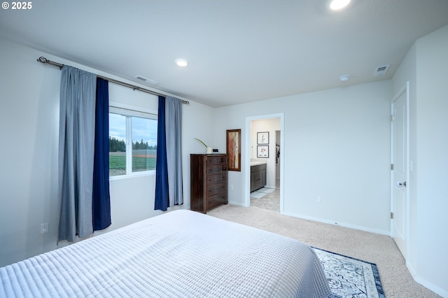 bedroom with light colored carpet, visible vents, baseboards, and recessed lighting