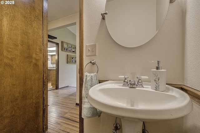 21445 NE Ornduff Rd, Hillsboro, OR 97123 - bathroom with hardwood / wood-style flooring and a sink