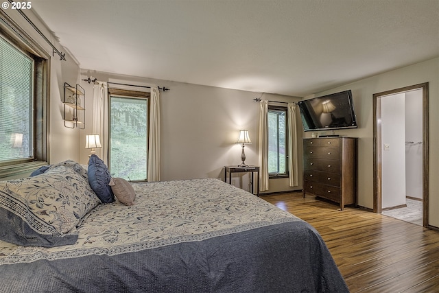 21445 NE Ornduff Rd, Hillsboro, OR 97123 - bedroom with wood finished floors and multiple windows