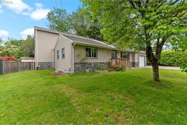 3116 NE 108th Ave, Portland, OR 97220 - view of front of home with stone siding, an attached garage, and driveway