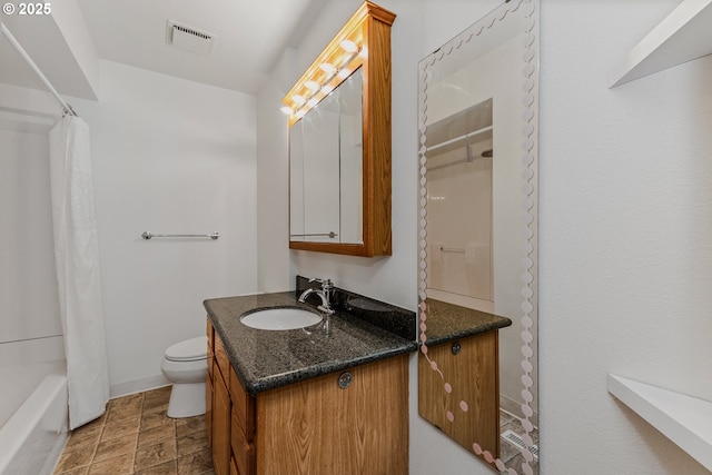 3116 NE 108th Ave, Portland, OR 97220 - bathroom featuring vanity, toilet, shower / bathtub combination with curtain, baseboards, and stone finish flooring