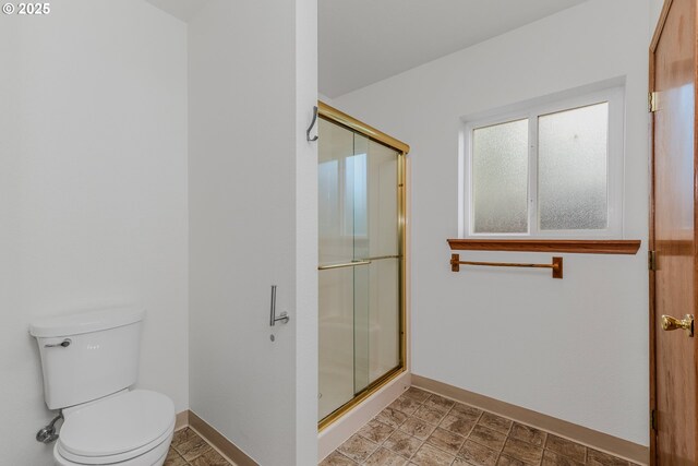 3116 NE 108th Ave, Portland, OR 97220 - full bathroom with baseboards, a stall shower, and toilet