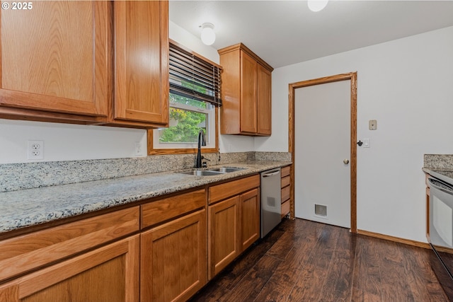 3116 NE 108th Ave, Portland, OR 97220 - kitchen with a sink, dishwasher, dark wood-style floors, light stone countertops, and brown cabinetry