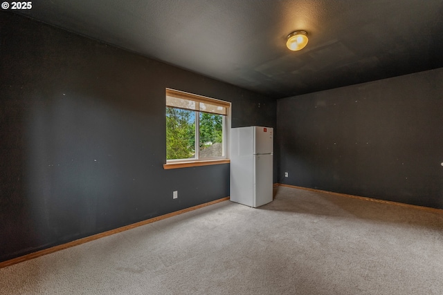 3116 NE 108th Ave, Portland, OR 97220 - spare room with carpet flooring and baseboards