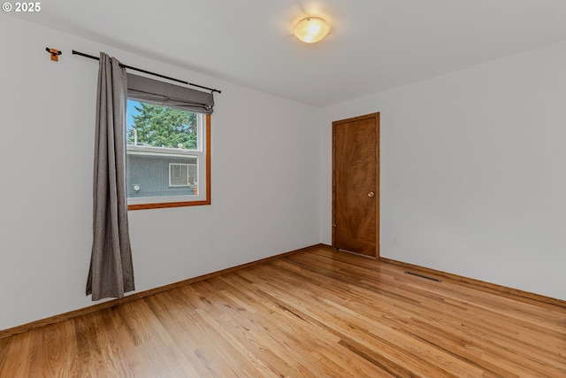 3116 NE 108th Ave, Portland, OR 97220 - empty room featuring light wood-style flooring and baseboards