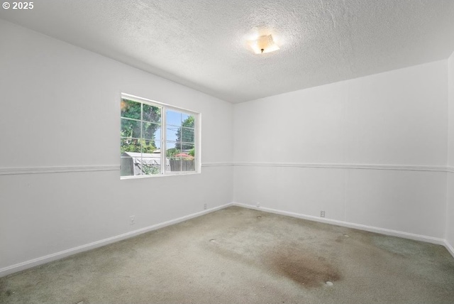 161 1st St, Dillard, OR 97432 - unfurnished room featuring a textured ceiling, carpet, and baseboards