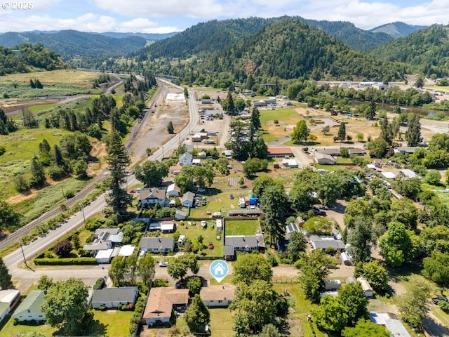161 1st St, Dillard, OR 97432 - aerial view of a mountain backdrop and a forest