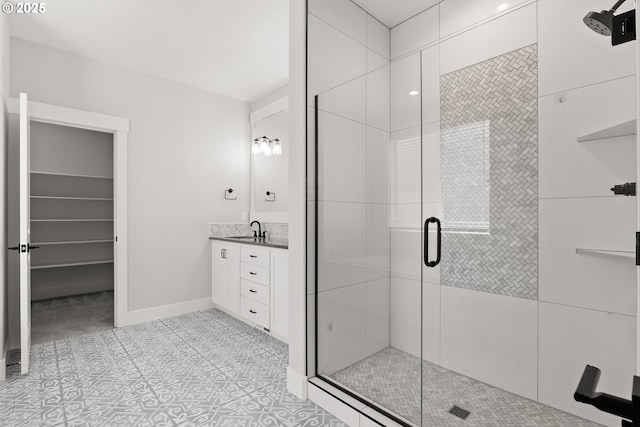 16706 NW Crossvine St, Portland, OR 97229 - full bath with a shower stall, vanity, and baseboards