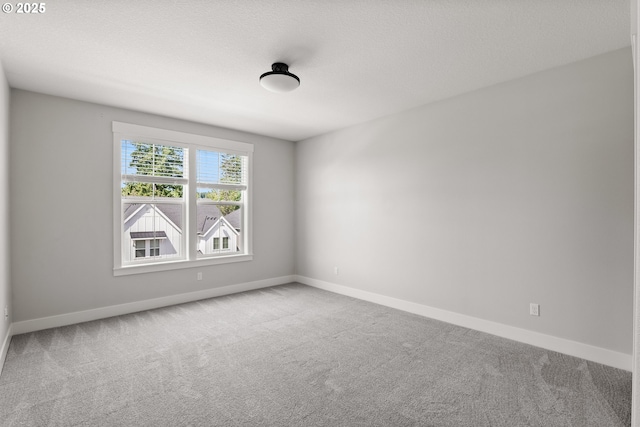 16706 NW Crossvine St, Portland, OR 97229 - carpeted empty room with baseboards