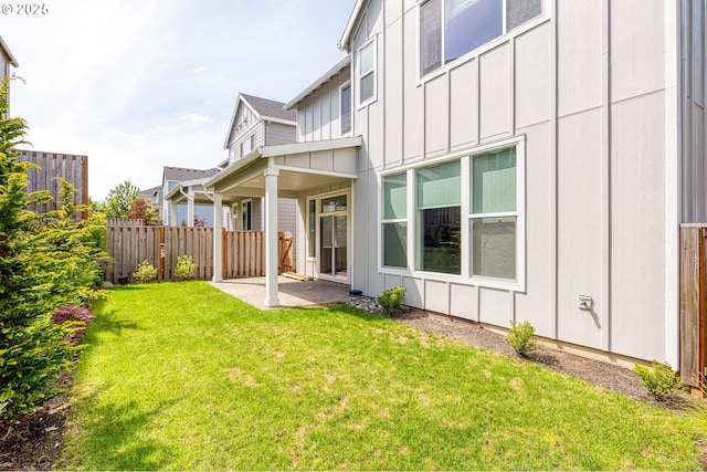 16706 NW Crossvine St, Portland, OR 97229 - rear view of house featuring board and batten siding and a patio