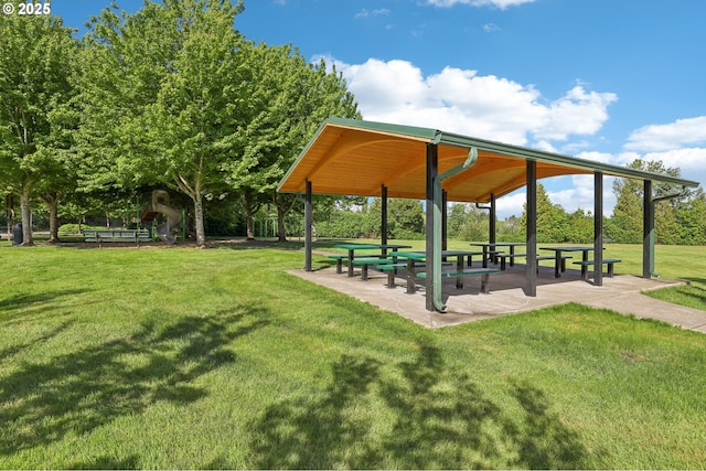 view of property's community with a gazebo and a yard