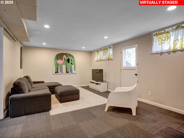 living room with dark carpet