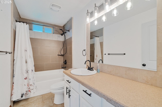 full bathroom featuring toilet, vanity, shower / tub combo, and tile patterned flooring