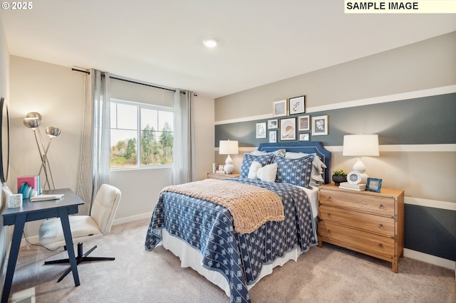 bedroom featuring carpet floors and baseboards